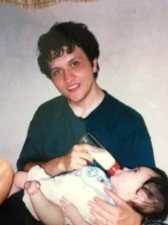 A picture of me when I was young, with my baby. — Photo 1