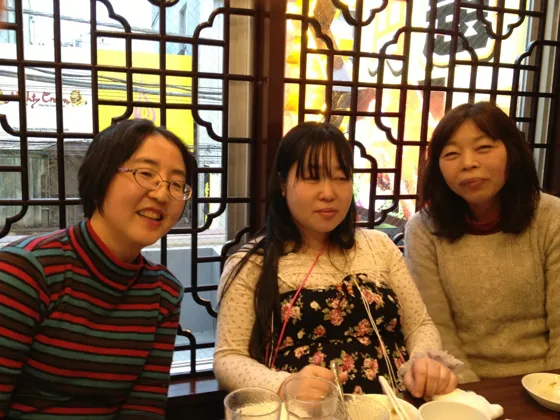 My wife with two friends. She is in the middle. — Photo 8